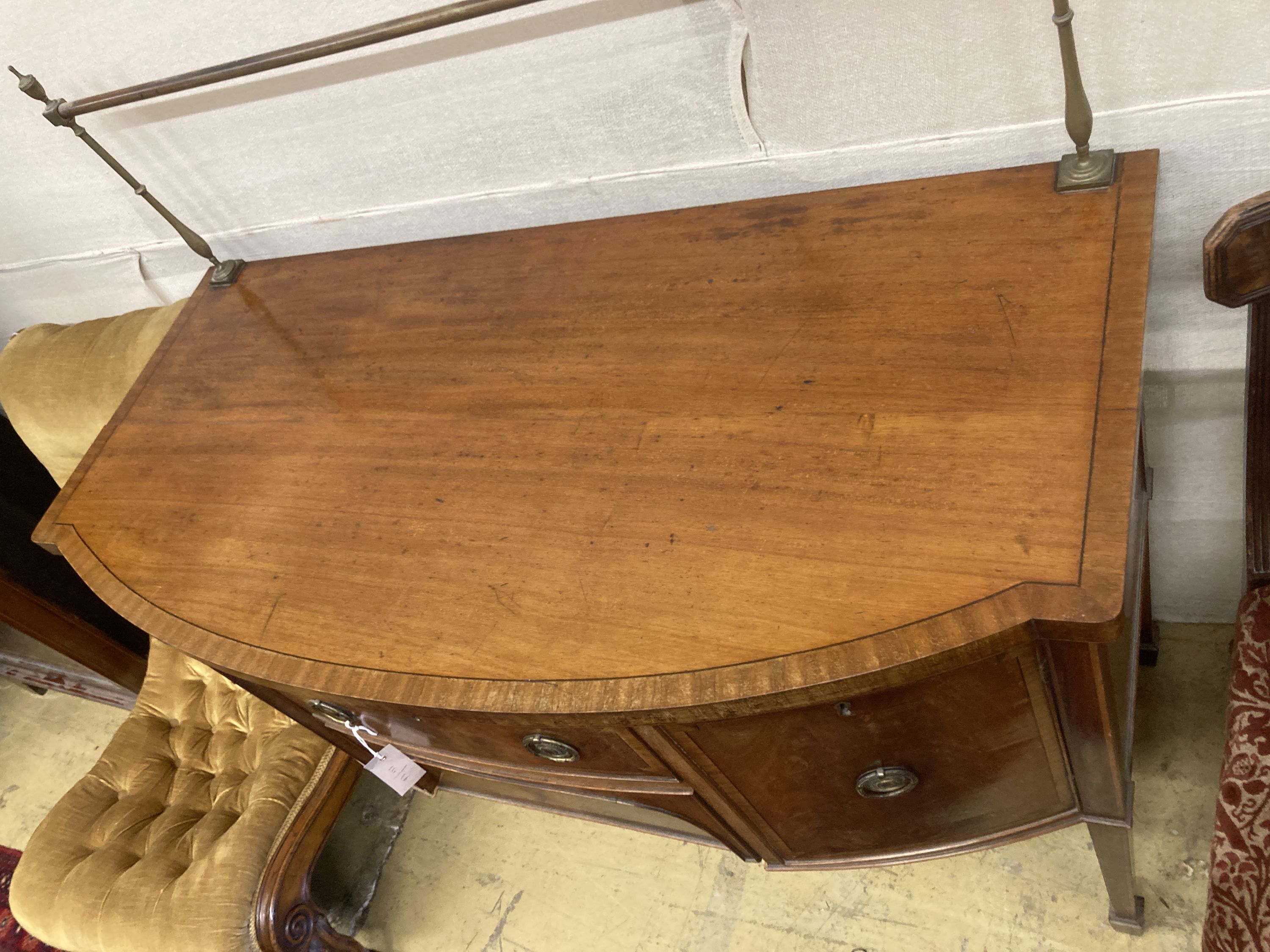 A small George III style mahogany bowfront sideboard, length 115cm, depth 56cm, height 120cm